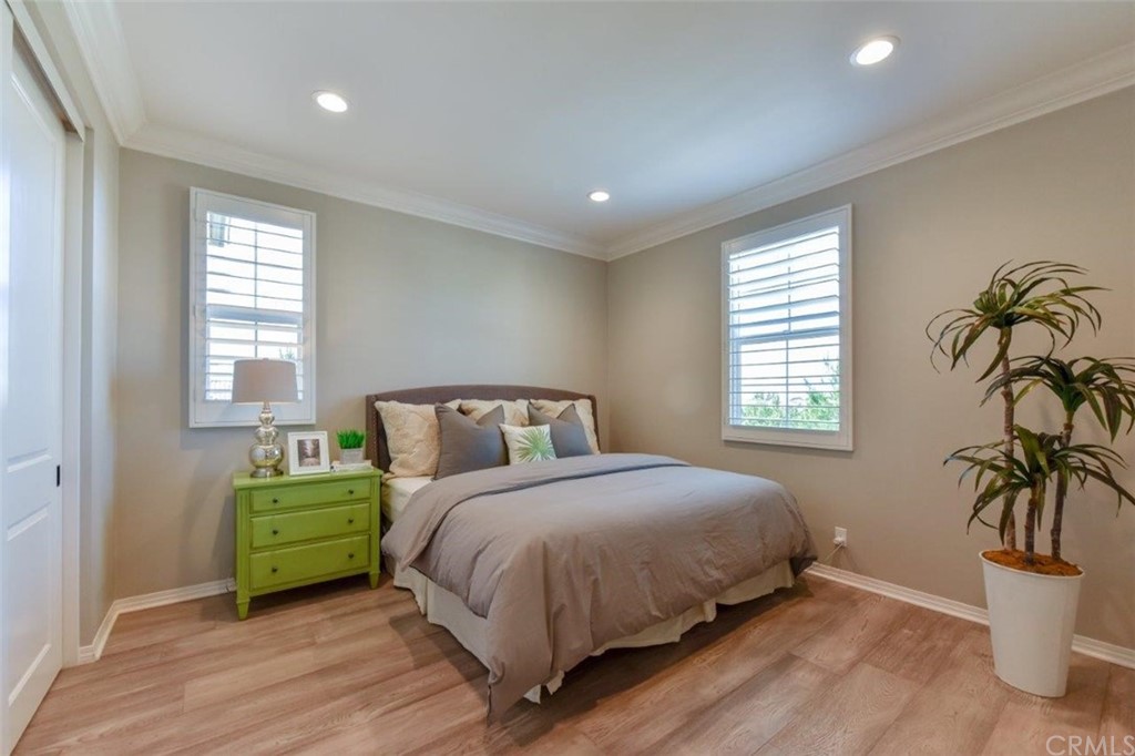 134 Paxton Irvine, CA 92620 - Photo 33 of 51 a bedroom with a bed and a window
