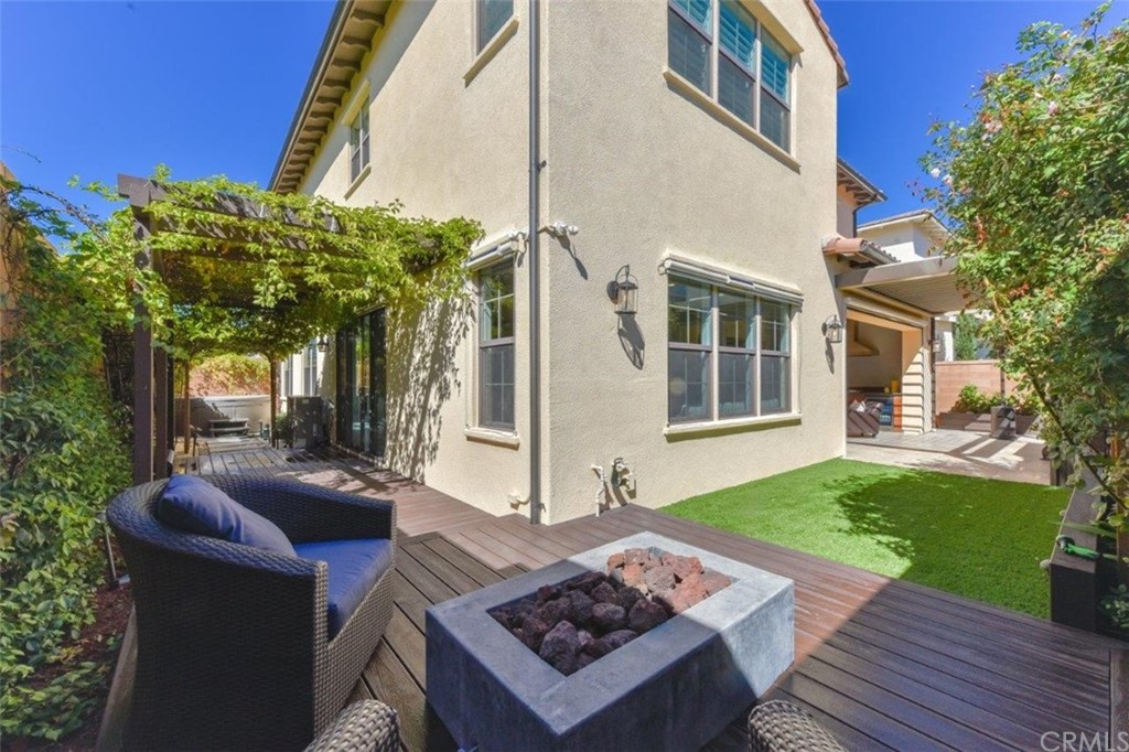 134 Paxton Irvine, CA 92620 - Photo 45 of 51 a view of a patio with couches table and chairs and potted plants