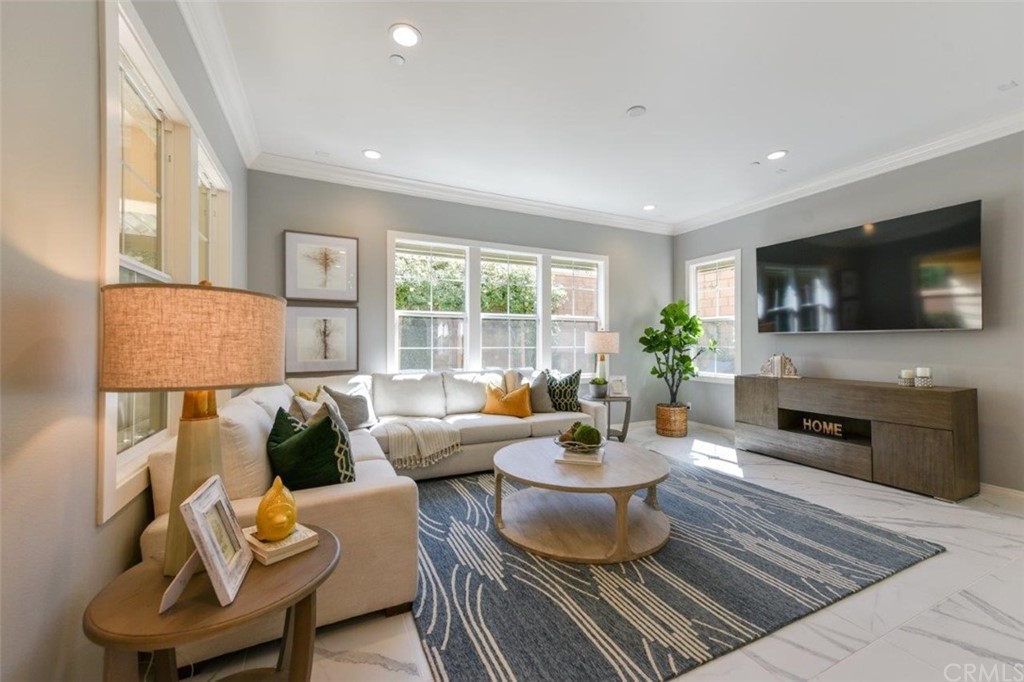 134 Paxton Irvine, CA 92620 - Photo 9 of 51 a living room with furniture and a flat screen tv