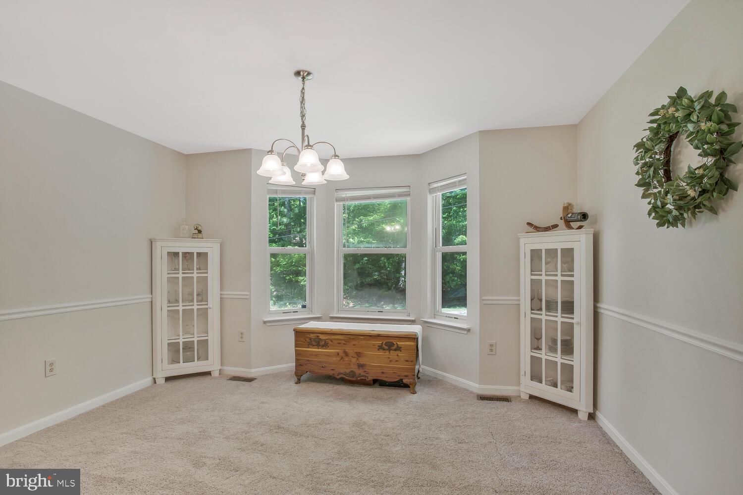 329 Red Cloud Road Lusby, MD 20657 - Photo 5 of 32 a view of an empty room with a window