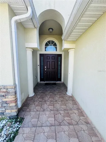 a view of entryway with a front door
