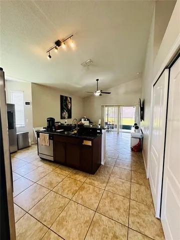 a living room with a couch and a shower
