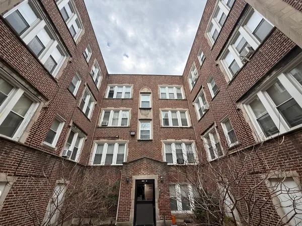 a front view of a multi story building