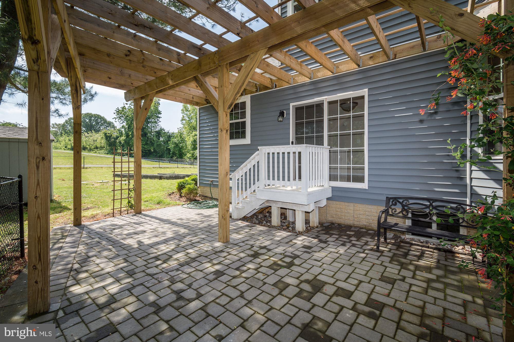 1695 Lottie Fowler Road Prince Frederick, MD 20678 - Photo 36 of 42 Extensive Wood Pergola to Enjoy Al Fresco Dining