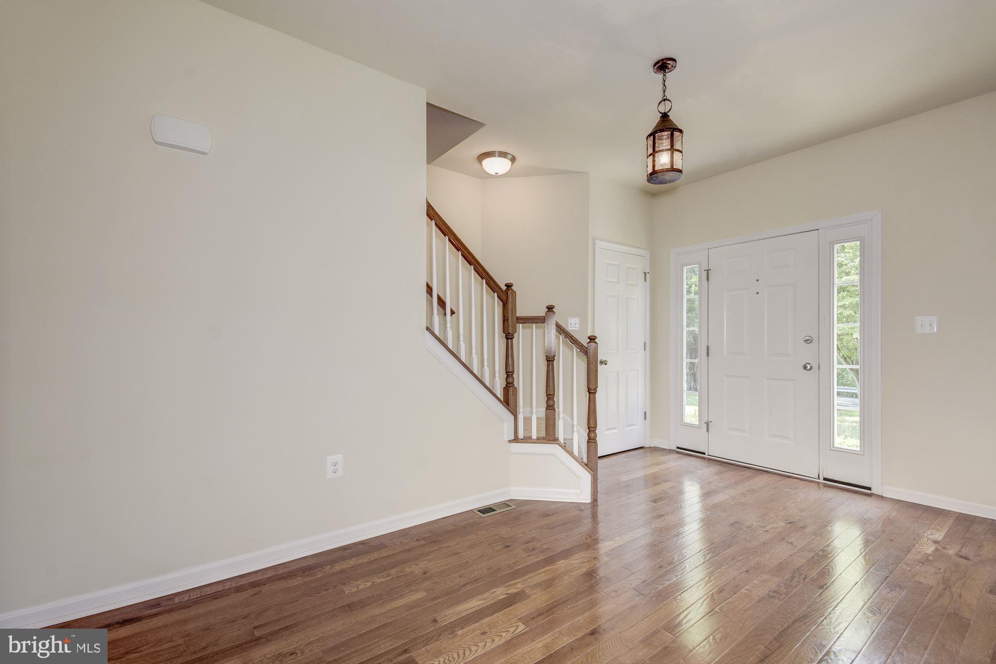1695 Lottie Fowler Road Prince Frederick, MD 20678 - Photo 5 of 42 Home is warmed by gleaming hardwoods