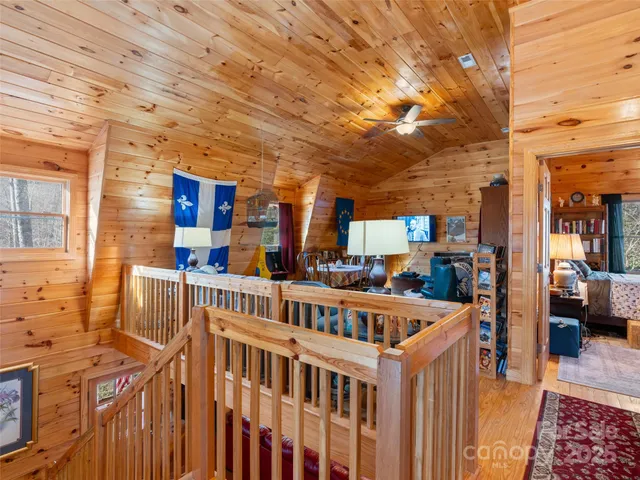 a view of a balcony with furniture