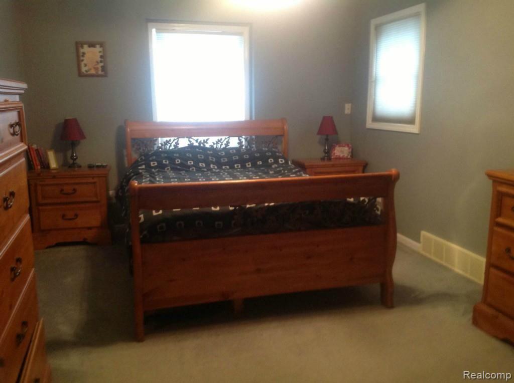 6300 Baker Road Howell, MI 48843 - Photo 10 of 16 Master Bedroom (1).jpg