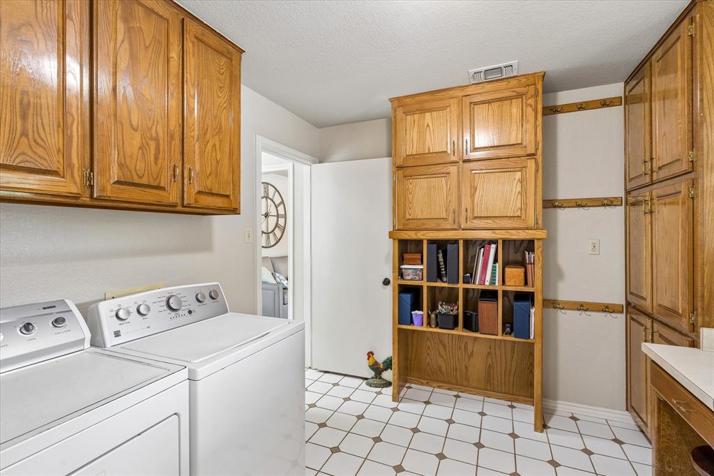 404 Moonlight Lane Keller, TX 76248 - Photo 16 of 40 a view of walk in closet with window and refrigerator