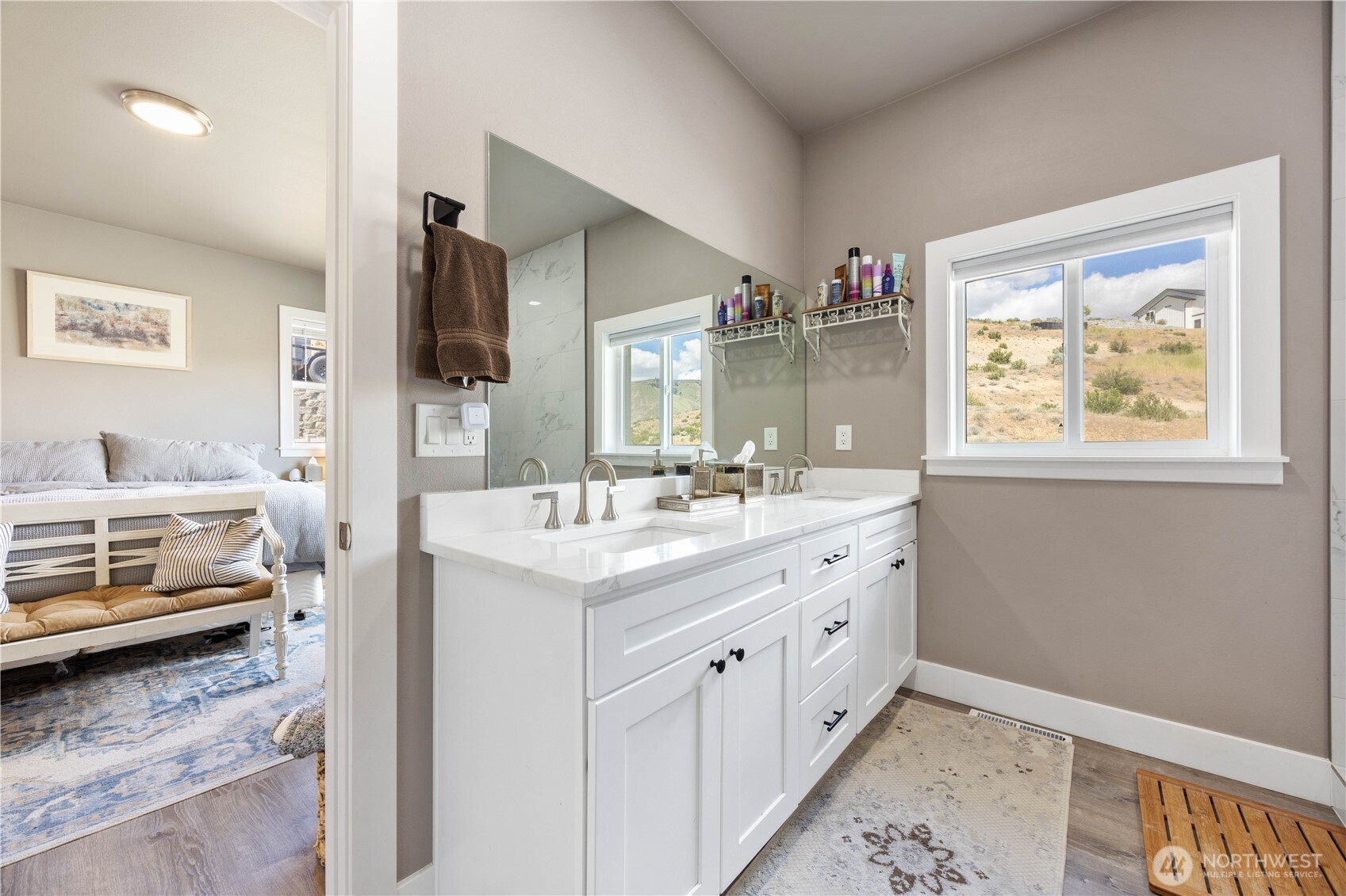 9968 Griffith Place Entiat, WA 98822 - Photo 17 of 38 a bathroom with a sink and a mirror