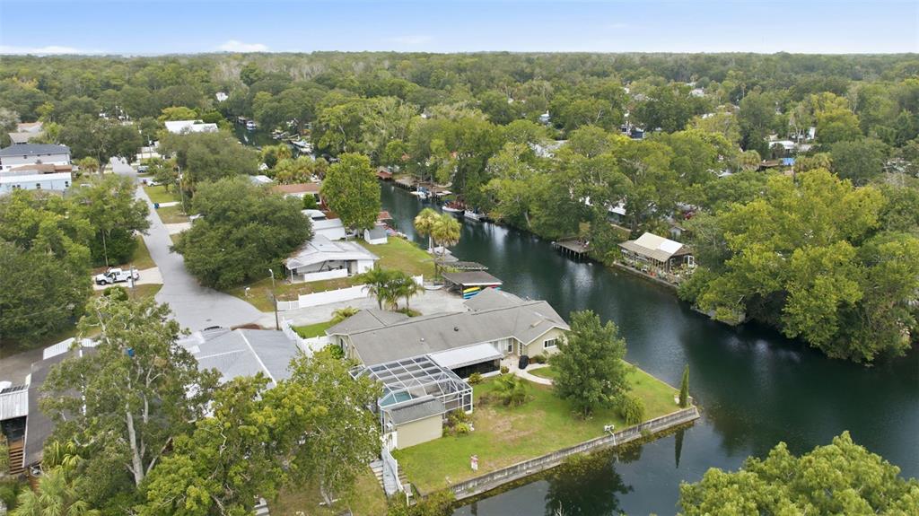 6355 Sebring Street Weeki Wachee, FL 34607 - Photo 60 of 65 an aerial view of residential house with outdoor space