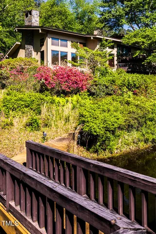 a view of a swimming pool with a deck