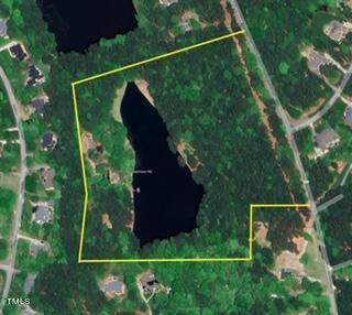 10305 Old Creedmoor Road Raleigh, NC 27613 - Photo 34 of 63 a view of a yard