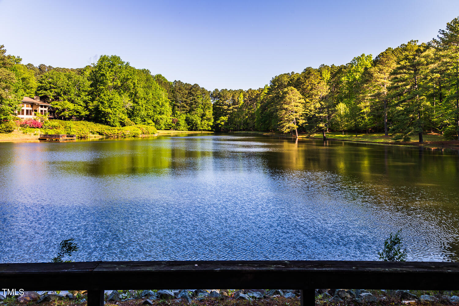 10305 Old Creedmoor Road Raleigh, NC 27613 - Photo 5 of 63 a view of a lake with houses