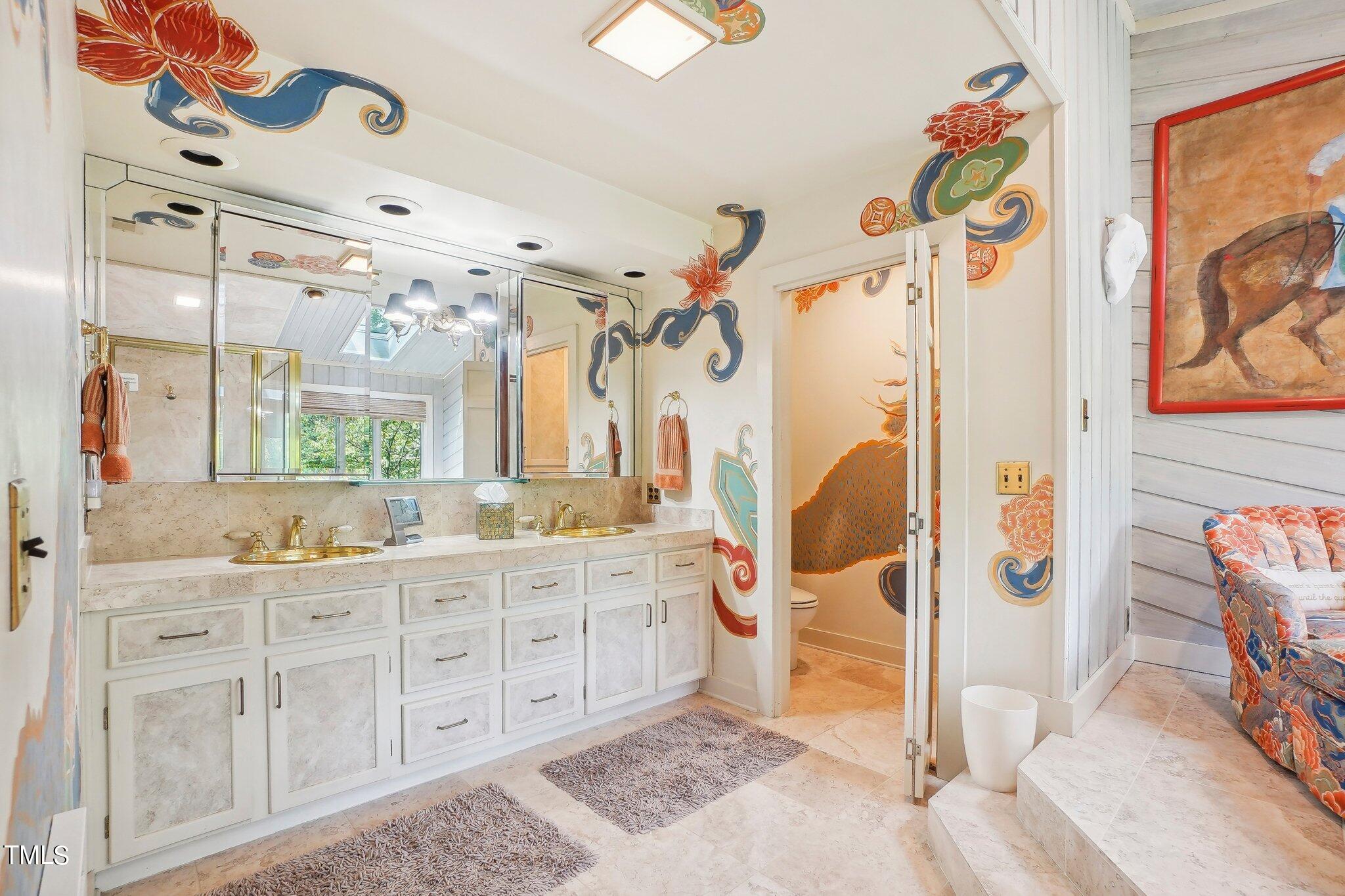 10305 Old Creedmoor Road Raleigh, NC 27613 - Photo 54 of 63 a spacious bathroom with a double vanity sink mirror and