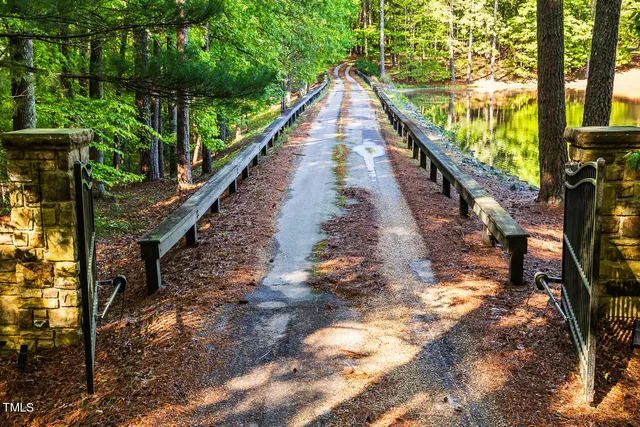 a view of swimming pool with a yard