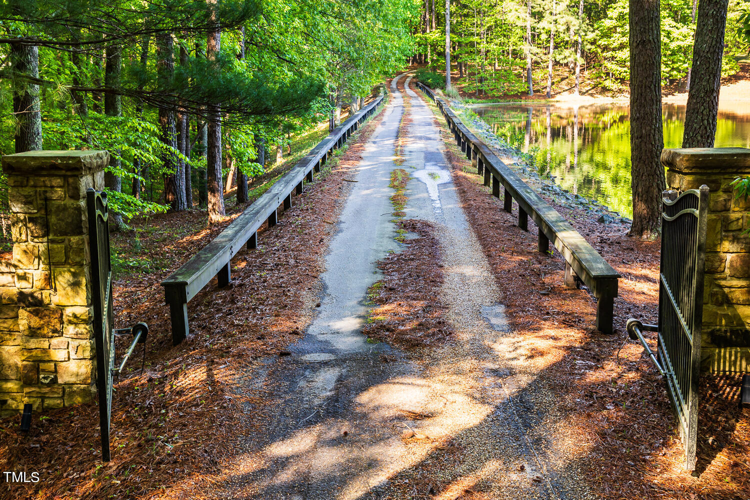 10305 Old Creedmoor Road Raleigh, NC 27613 - Photo 7 of 63 a view of balcony and wooden floor