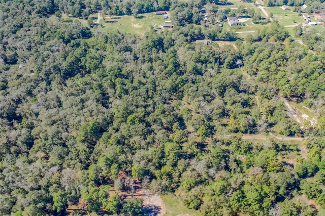a view of a lake with a house