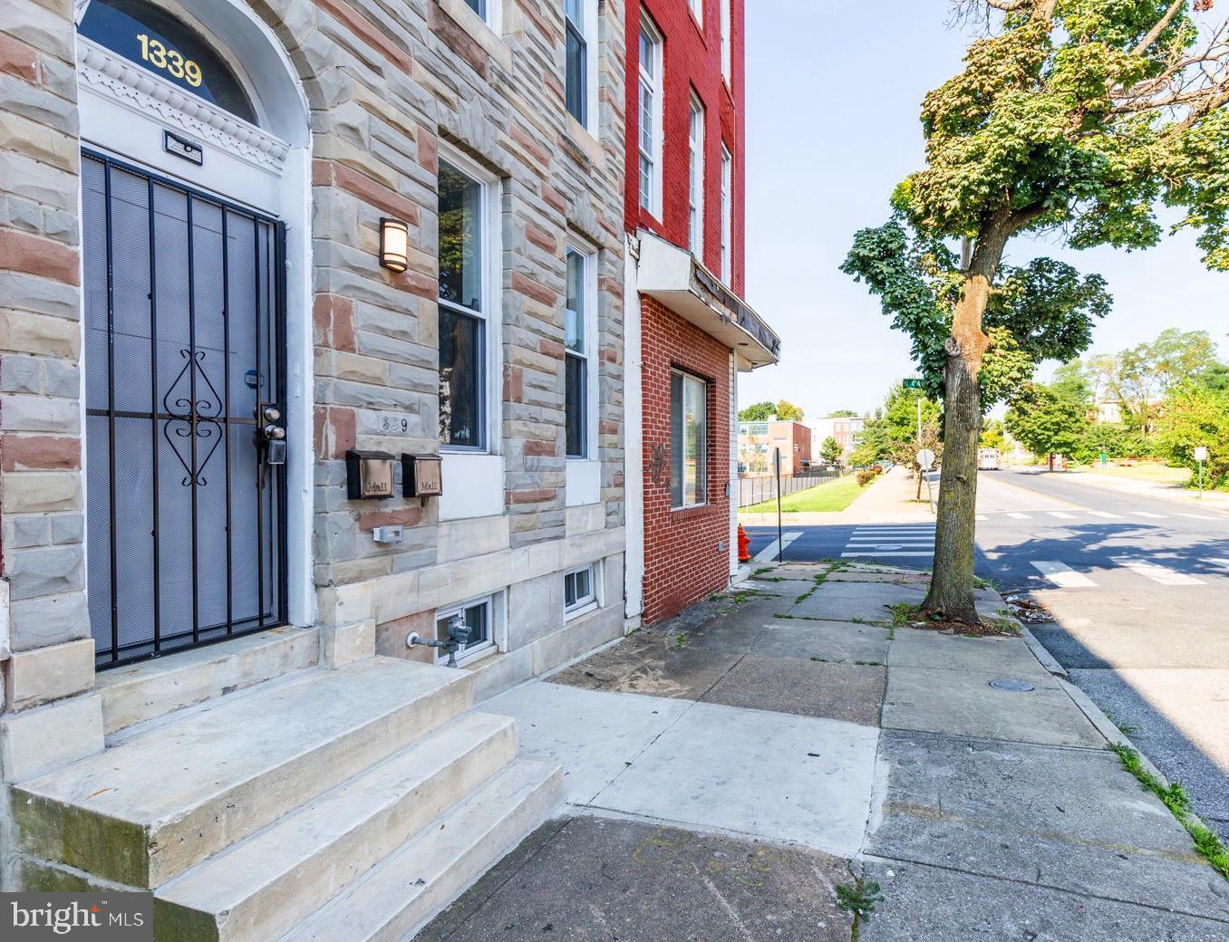 1339 West Lafayette Avenue, Unit 1 Baltimore, MD 21217 - Photo 1 of 24 a view of a house with a patio