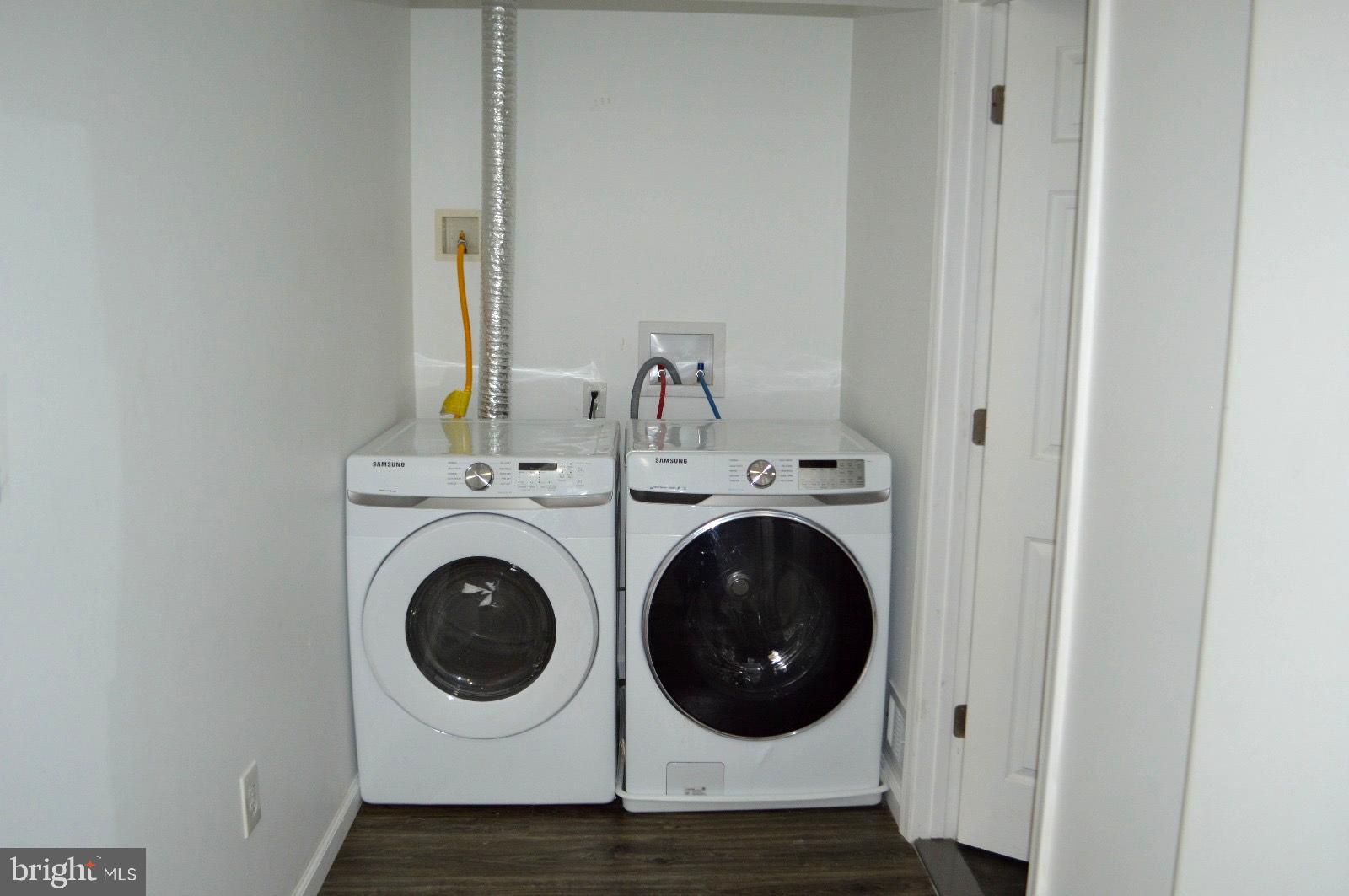 1339 West Lafayette Avenue, Unit 1 Baltimore, MD 21217 - Photo 17 of 24 a utility room with dryer and washer