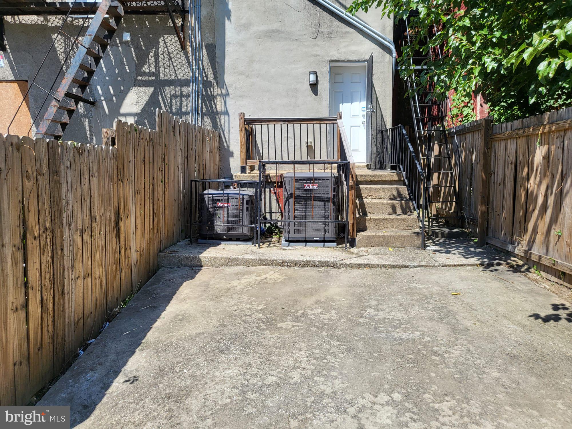 1339 West Lafayette Avenue, Unit 1 Baltimore, MD 21217 - Photo 24 of 24 a view of a house with wooden fence