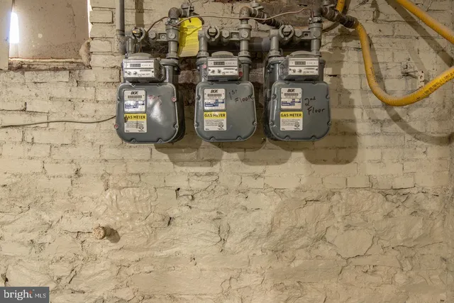 a view of a kitchen from a hallway