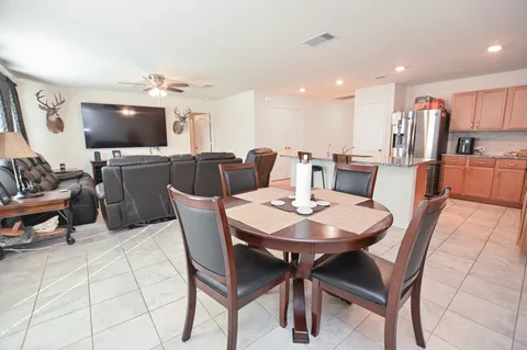 a view of a dining room with furniture
