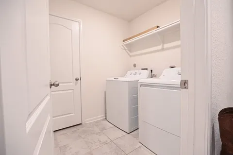 a view of bathroom with utility room