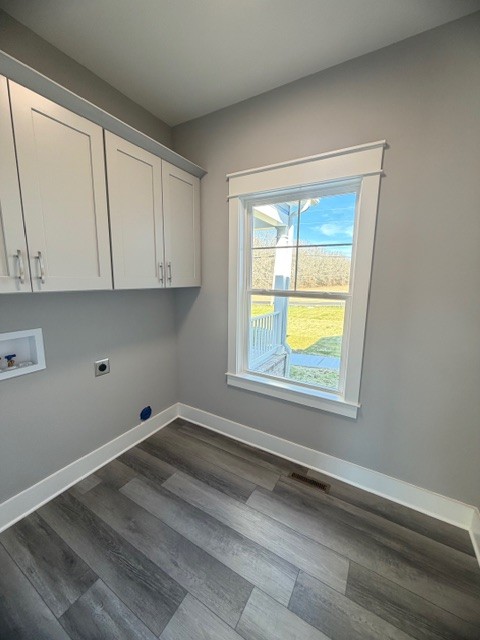 6421 Lynchburg Road Winchester, TN 37398 - Photo 20 of 25 a view of a kitchen with wooden floor and a window