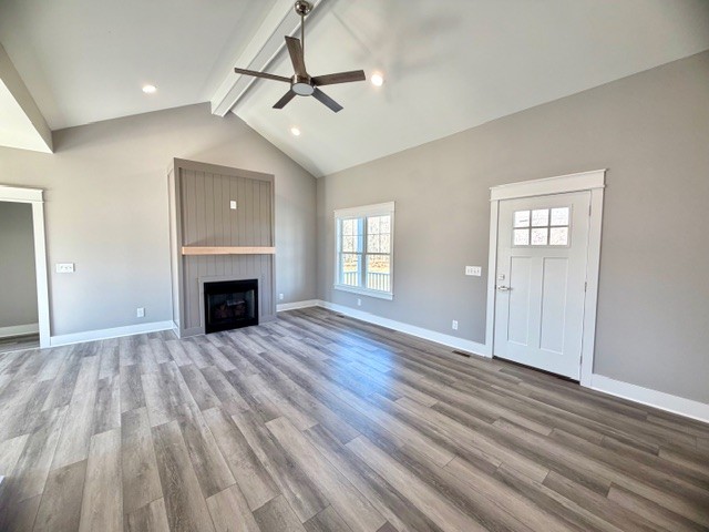 6421 Lynchburg Road Winchester, TN 37398 - Photo 3 of 25 a view of empty room with wooden floor and fireplace