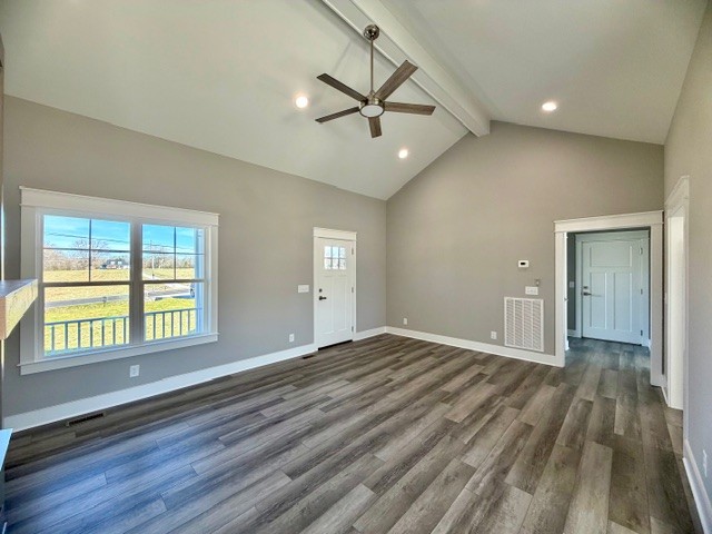 6421 Lynchburg Road Winchester, TN 37398 - Photo 4 of 25 a view of an empty room with wooden floor and a window