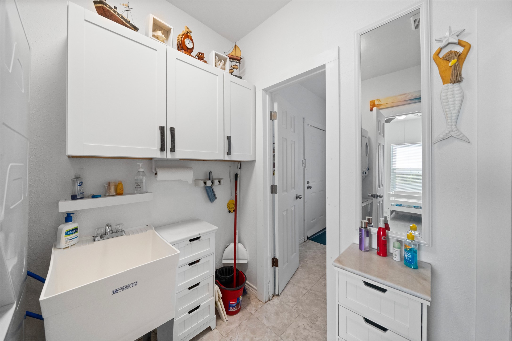 3130 Fm-2031 Matagorda, TX 77457 - Photo 18 of 25 a view of storage and utility room with washer and dryer