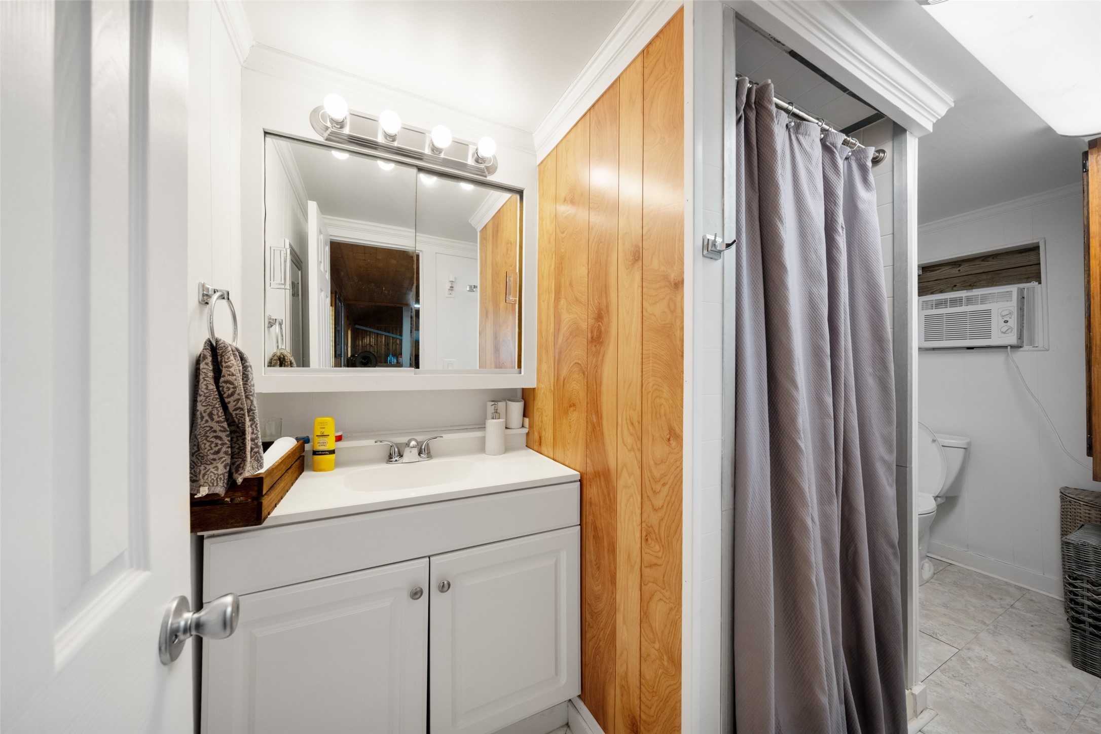 3130 Fm-2031 Matagorda, TX 77457 - Photo 19 of 25 a bathroom with a sink and a mirror