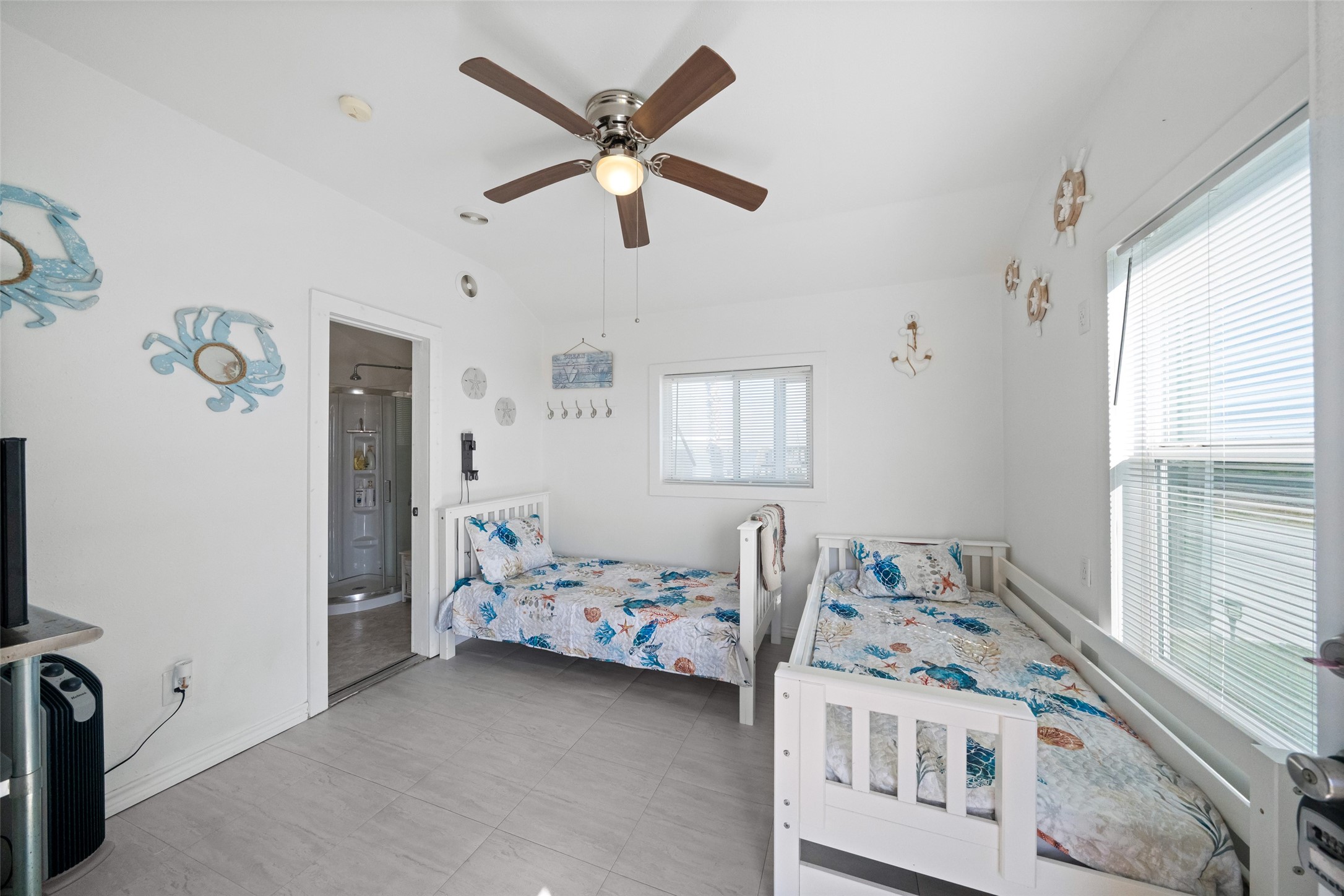 3130 Fm-2031 Matagorda, TX 77457 - Photo 21 of 25 a bedroom with furniture and windows