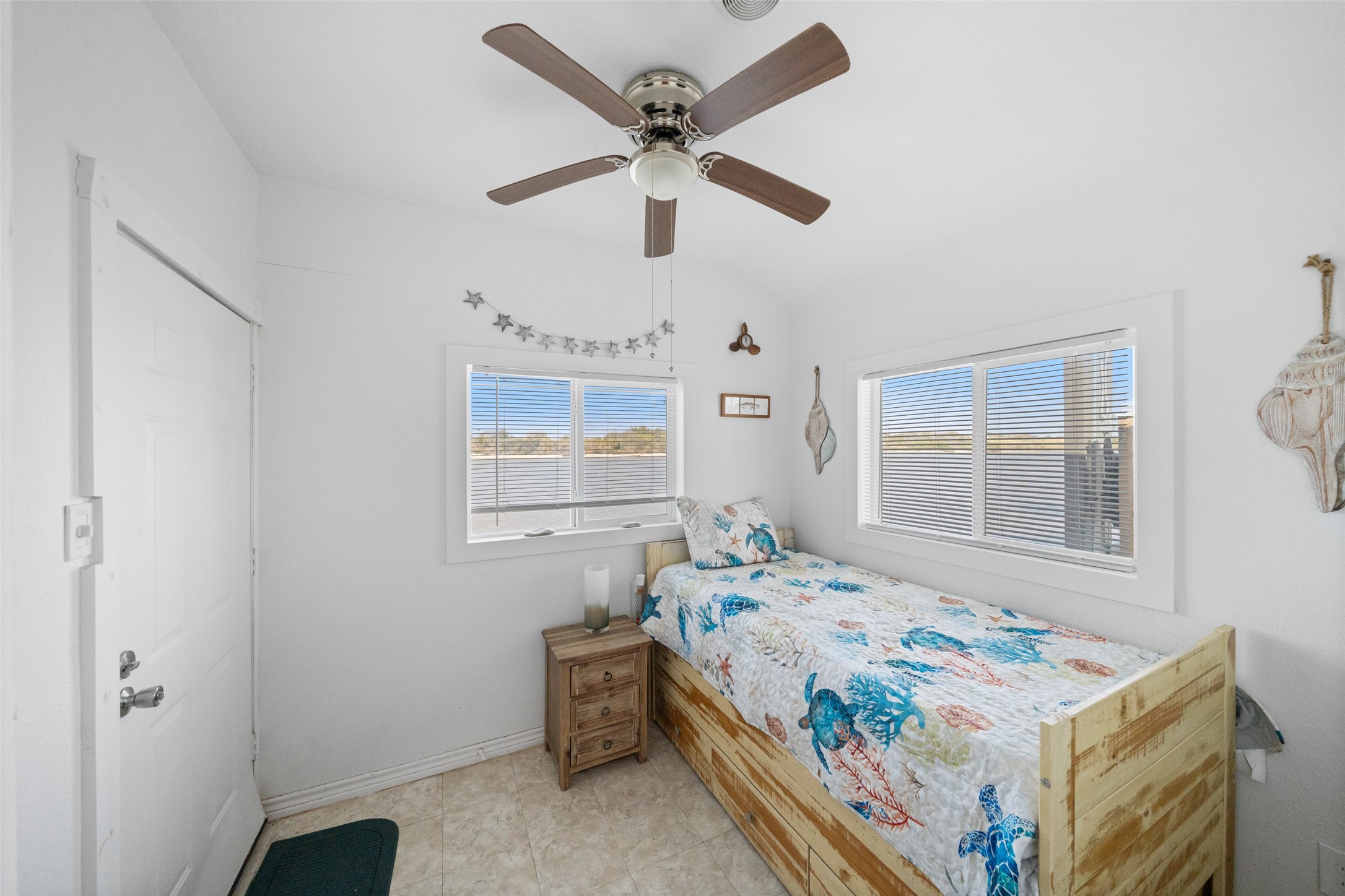 3130 Fm-2031 Matagorda, TX 77457 - Photo 22 of 25 a bedroom with a bed and a table