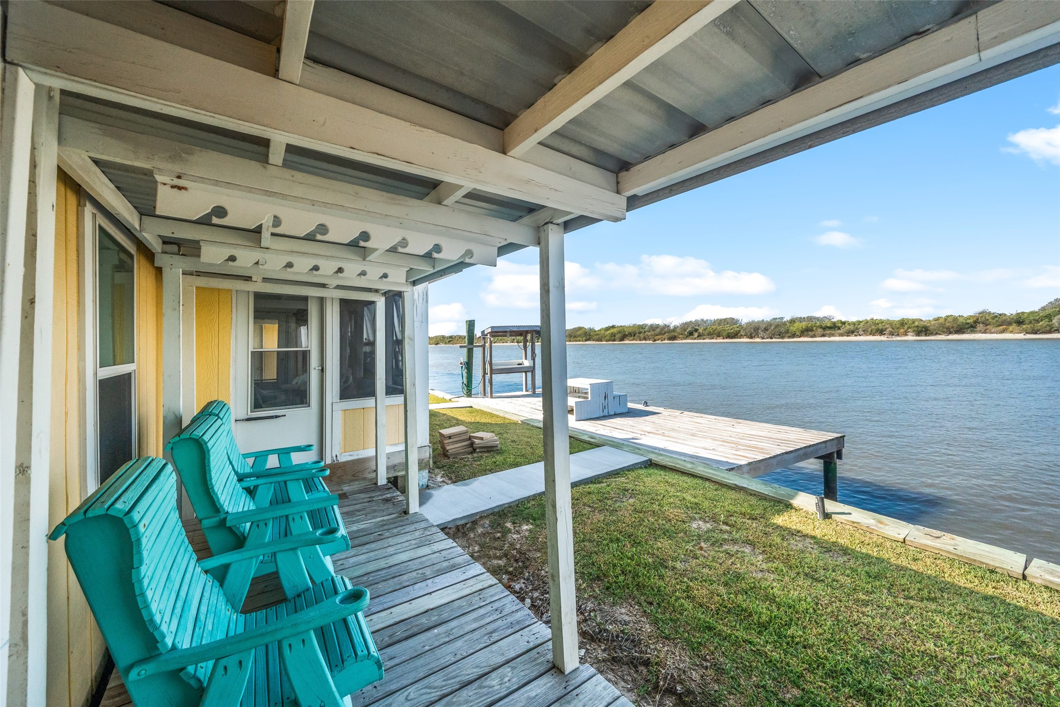 3130 Fm-2031 Matagorda, TX 77457 - Photo 3 of 25 a balcony with furniture and wooden floor