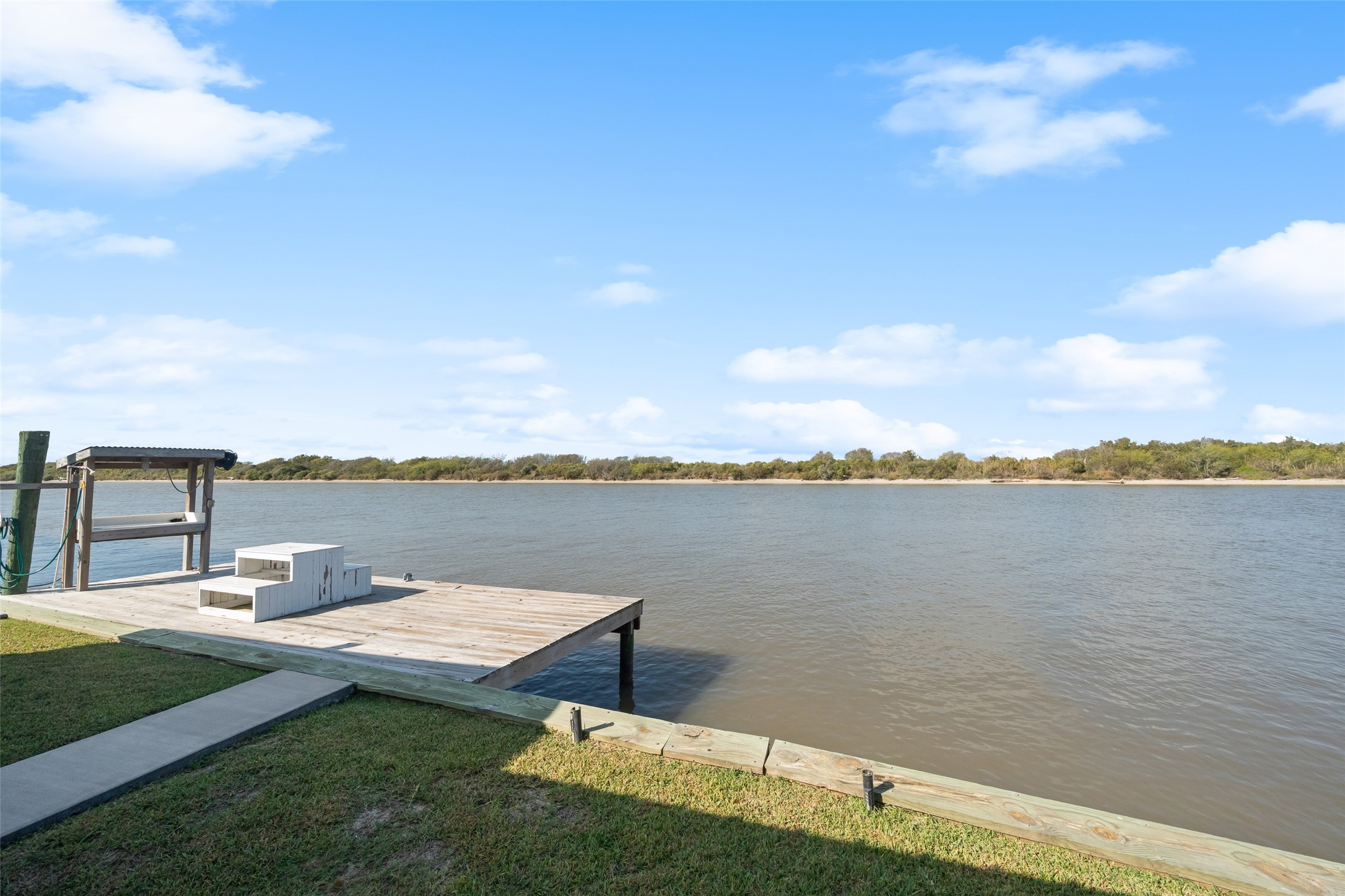 3130 Fm-2031 Matagorda, TX 77457 - Photo 4 of 25 a view of a lake with couches in front of house