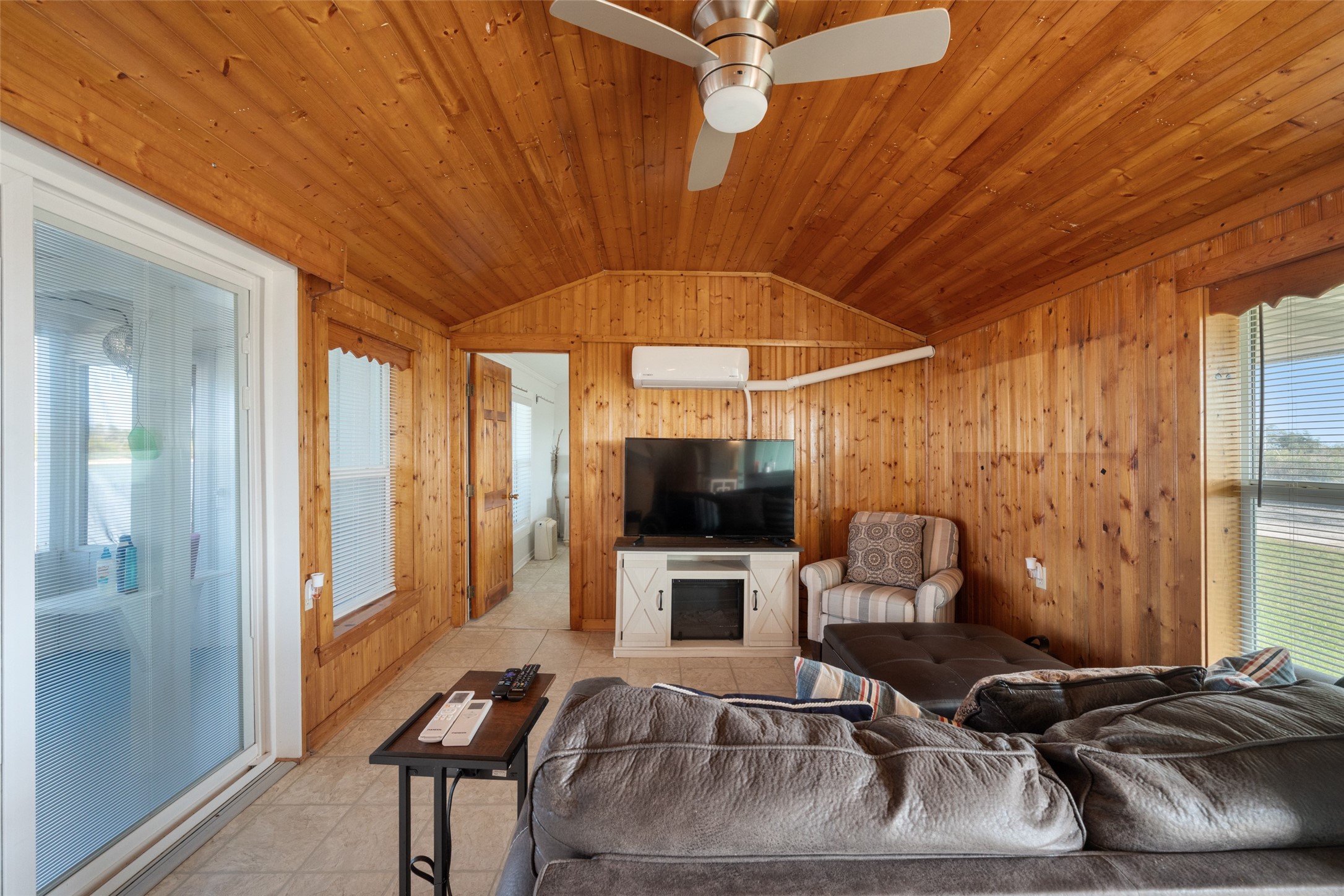 3130 Fm-2031 Matagorda, TX 77457 - Photo 7 of 25 a room with furniture and flat screen tv