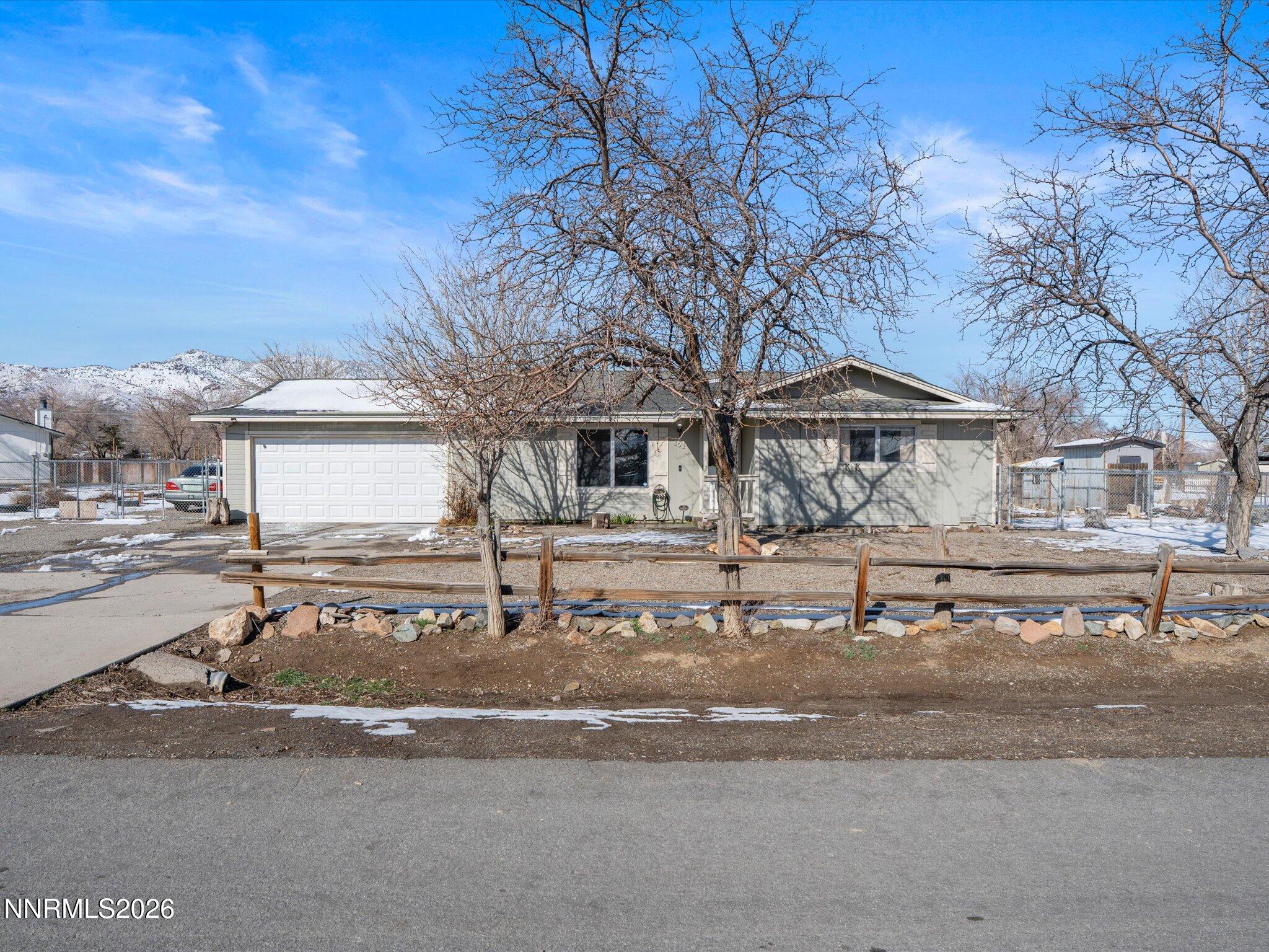 151 Roughing It Road Dayton, NV 89403 - Photo 1 of 25 front view of a house with a street