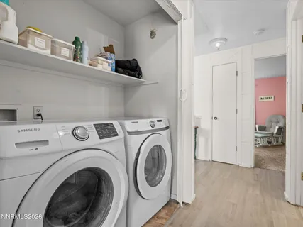 a view of washer and dryer in a utility room