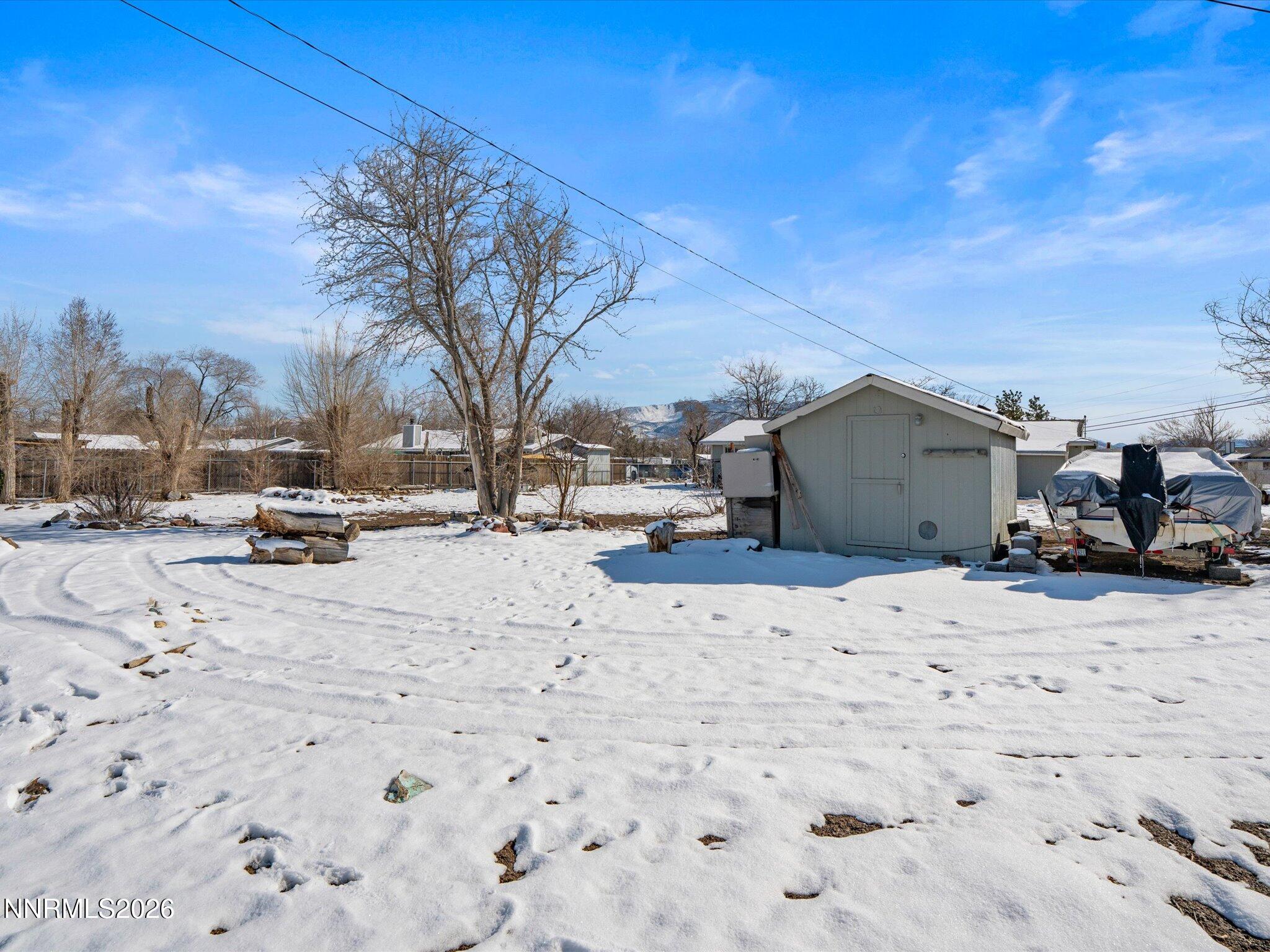 151 Roughing It Road Dayton, NV 89403 - Photo 19 of 25 a view of road with a snow on the road