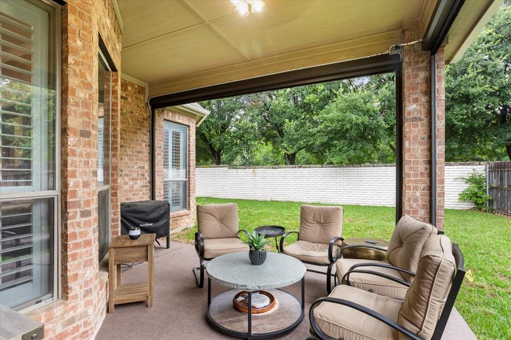 8312 Teja Trail Benbrook, TX 76126 - Photo 21 of 23 a living room with furniture and a potted plant
