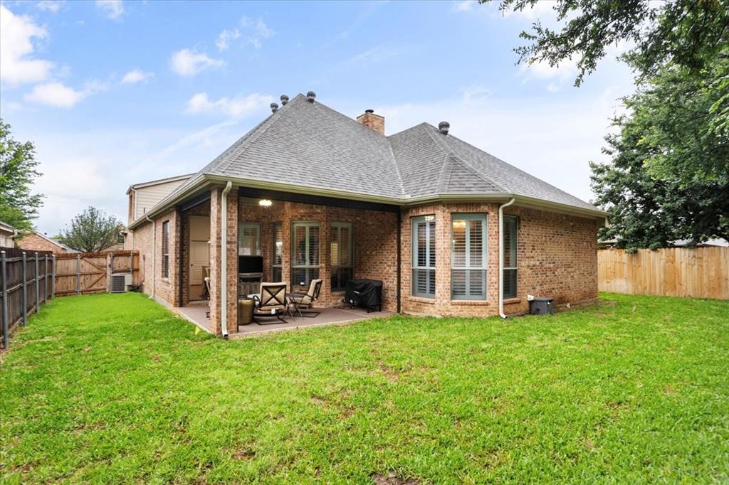 8312 Teja Trail Benbrook, TX 76126 - Photo 23 of 23 a view of a house with a yard and sitting area