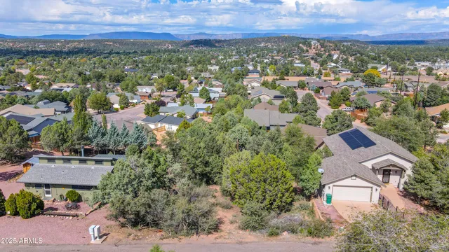 an aerial view of residential house with outdoor space