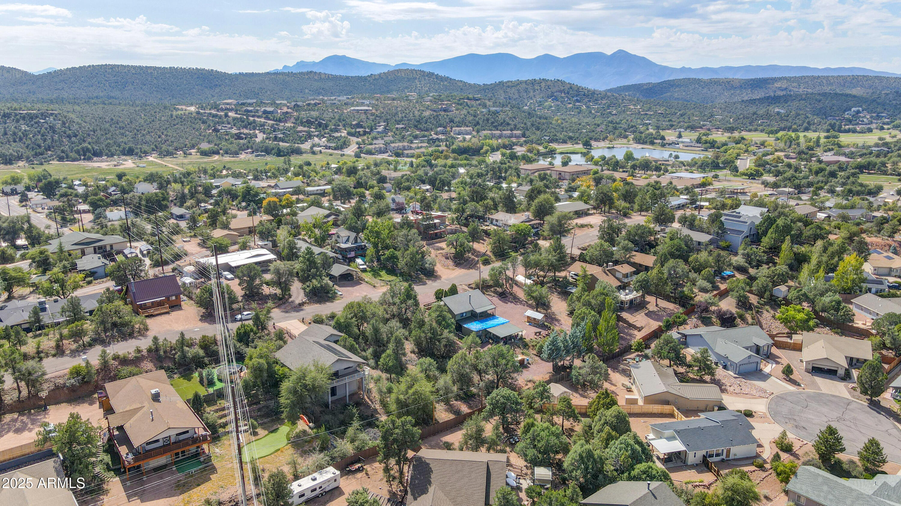 814 West Rim View Road, Unit 10 Payson, AZ 85541 - Photo 4 of 9 an aerial view of residential houses with outdoor space and trees