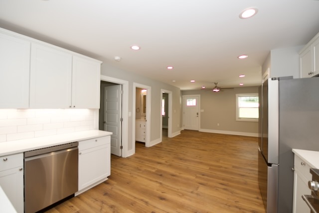317 Pendleton Road Clemson, SC 29631 - Photo 20 of 36 A well-appointed kitchen flows into an open-concept living area with durable wood flooring.