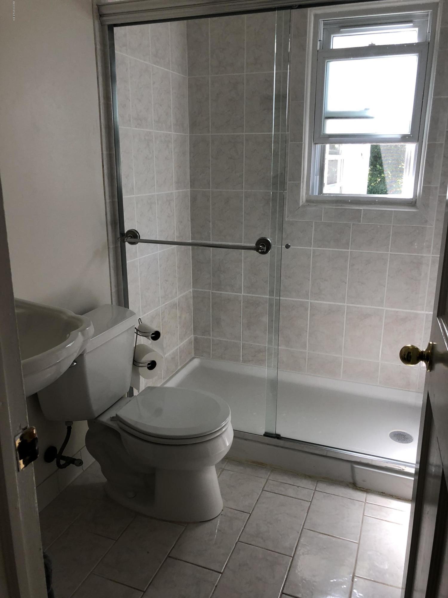 84 Indian Field Road Greenwich, CT 06830 - Photo 6 of 19 a bathroom with a toilet and a shower