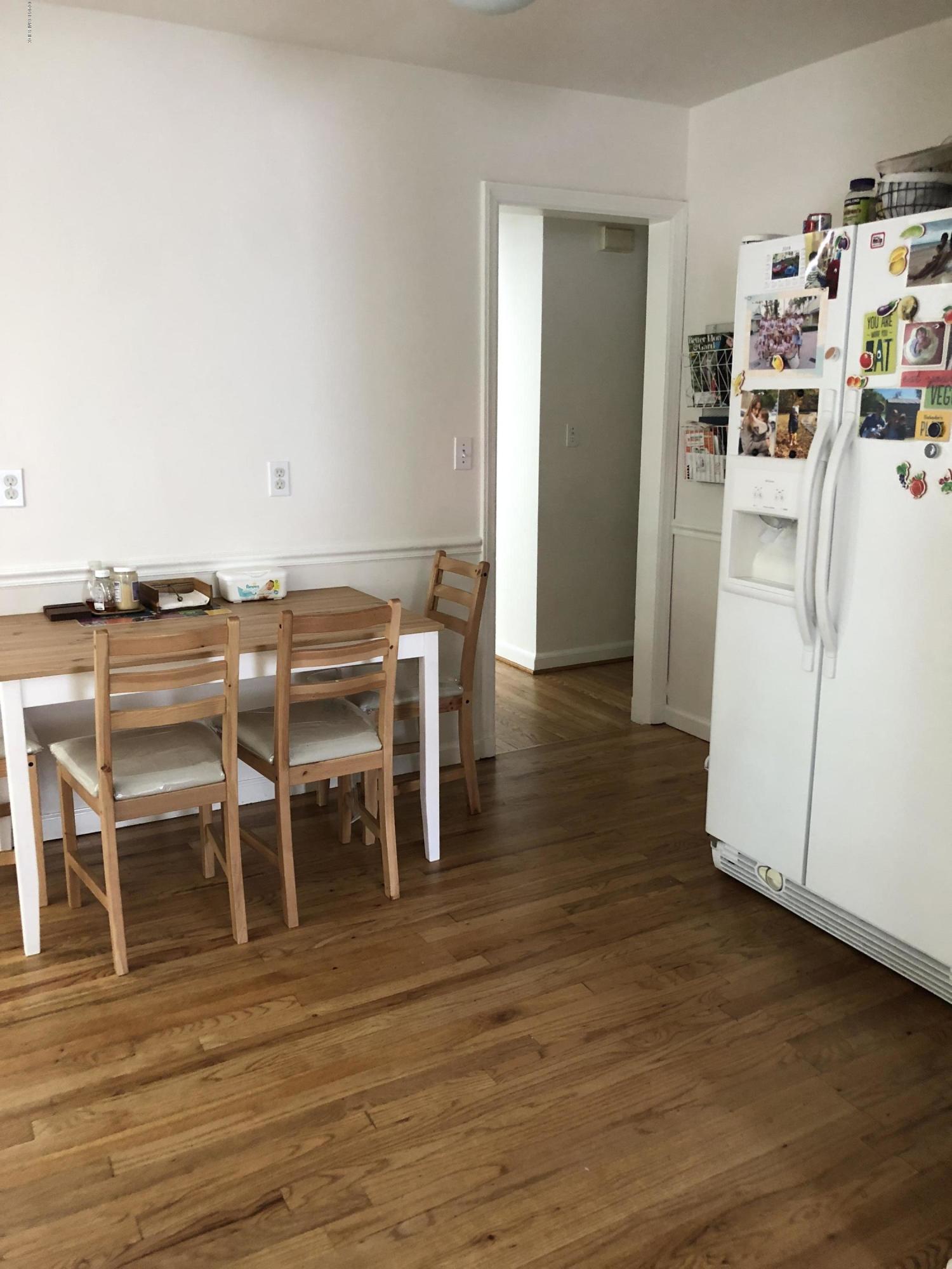 84 Indian Field Road Greenwich, CT 06830 - Photo 8 of 19 a view of a dining room with furniture and wooden floor