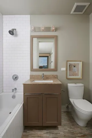 a view of a terrace with couches and potted plants