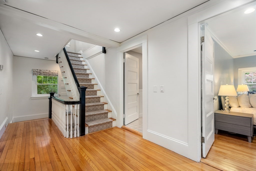 11 Hillside Road Wellesley, MA 02481 - Photo 15 of 29 a view of a room with wooden floor and stairs
