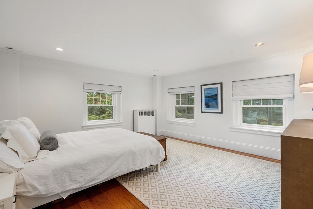 11 Hillside Road Wellesley, MA 02481 - Photo 18 of 29 a bedroom with a large bed and a couch